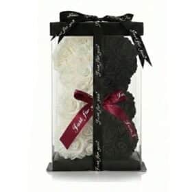 Oso rosa blanco y negro con lazo